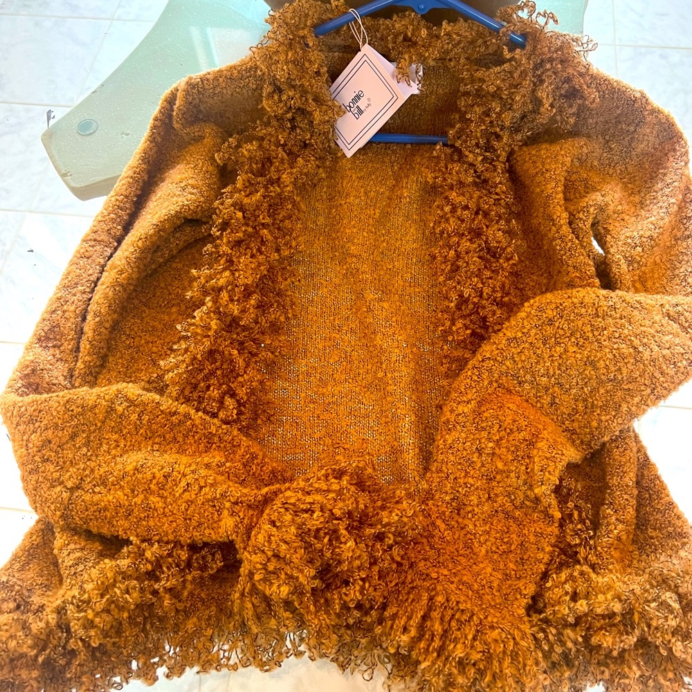 Beautiful sweater. Never worn. Tags still on